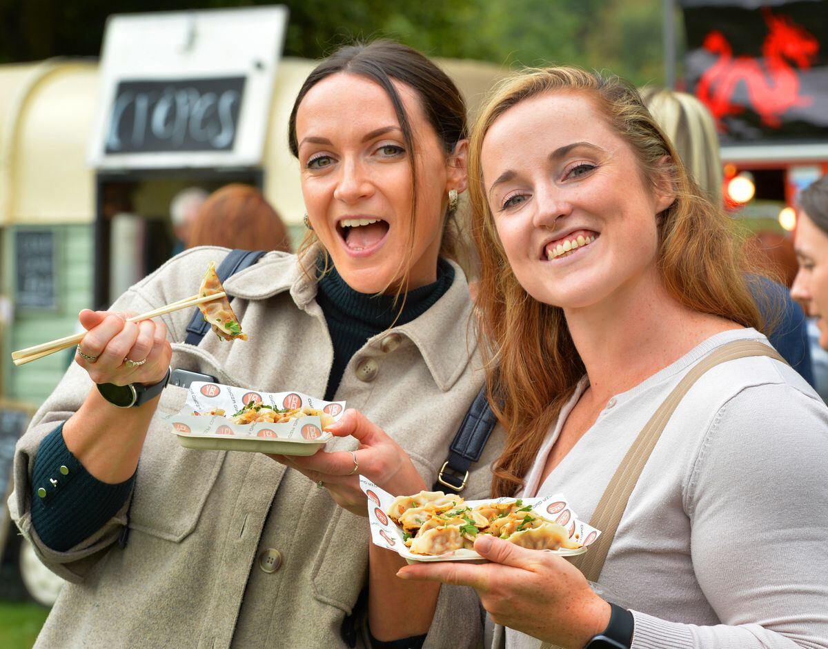 Enjoying Japanese street food, (left-right) Tash McEntagart and Amy Brownridge, both of Telford, during Shrewsbury Food Festival