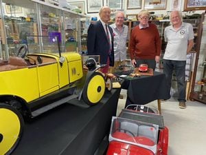 Charlie Ross with Cloverlands Model Car Museum trustees Max Tomlinson, Bruce Lawson and John Nunn.
