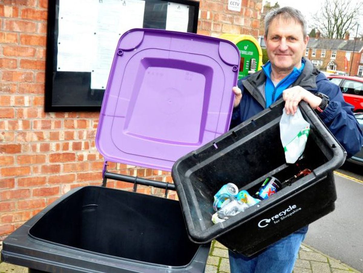 Councillor Ian Nellins with the new bin