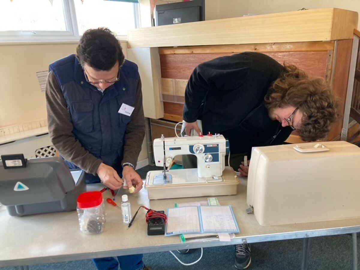 Andrew and Edward Moore testing a sewing machine at a recent Ludlow Repair Café