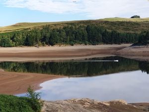 The Clywedog reservoir in Llanidloes which releases water to run into the Severn