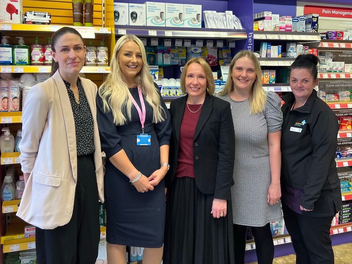 Helen Morgan MP, centre, with staff from Rowlands Pharmacy and representatives of the industry