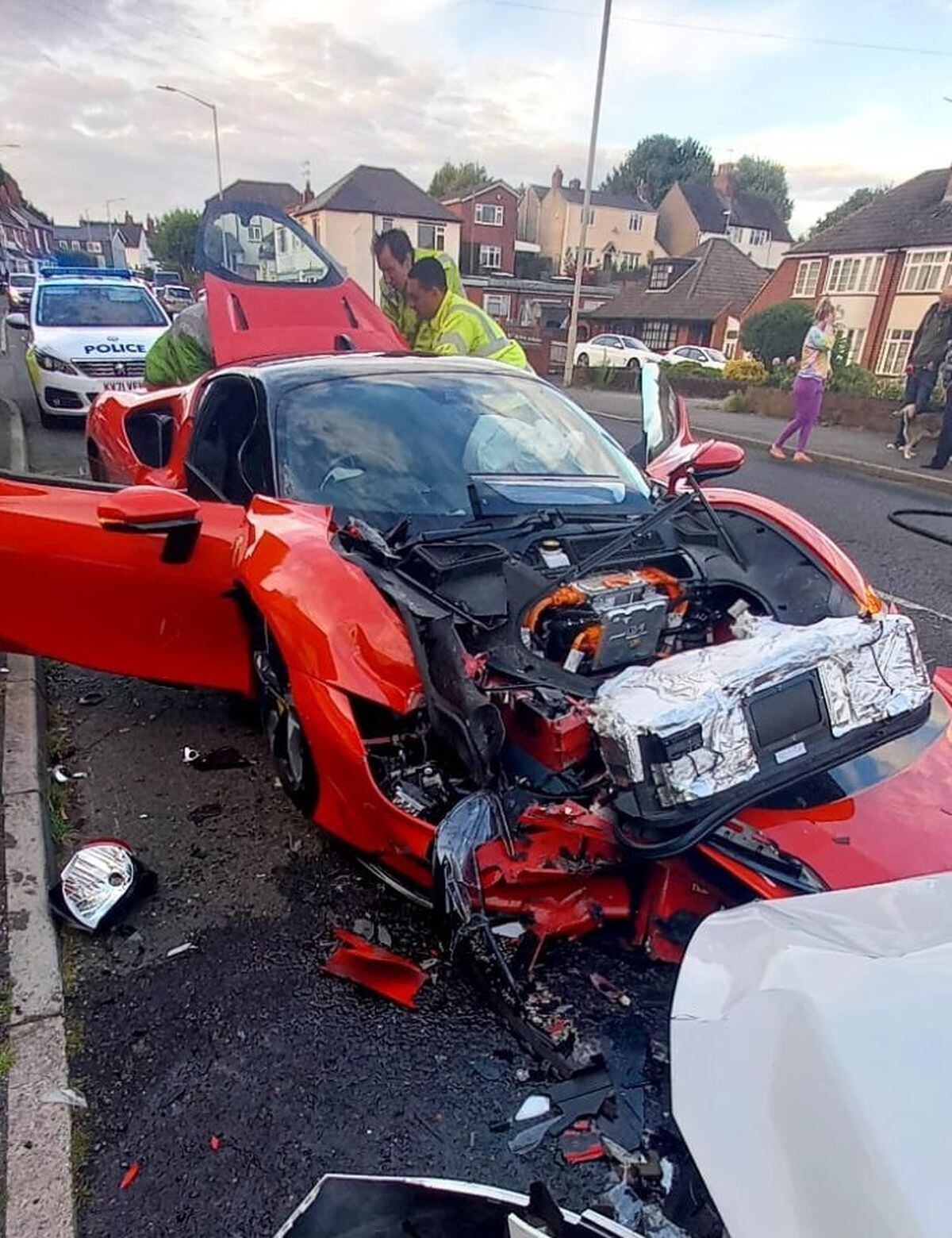 The Ferrari hit a parked car, causing a chain reaction behind it. Photo: Haden Cross Fire Station