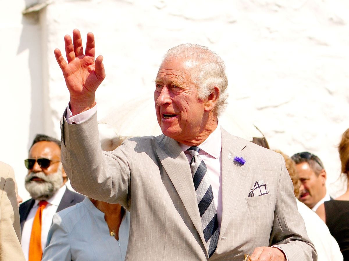 The Prince of Wales during a visit to the fishing village of Mousehole in Penzance, Cornwall