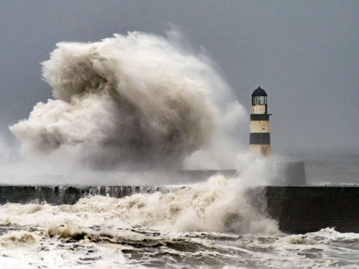 In pictures: ‘Atrocious’ weather as band of rain travels across the UK ...