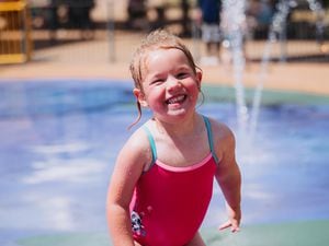 Isabel Smart, two, makes the most of the heat at Telford Town Centre's splash park
