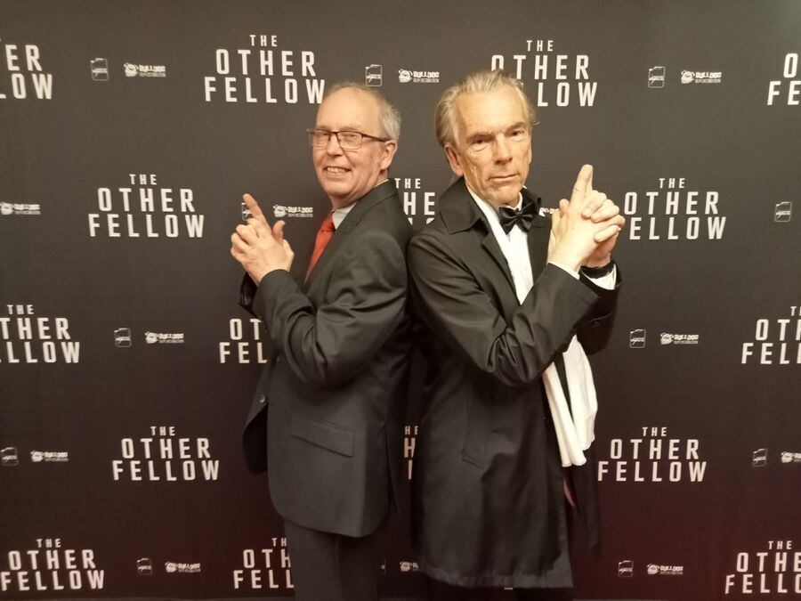 Shropshire's James Bond, left, with a namesake at the premier of The Other Fellow