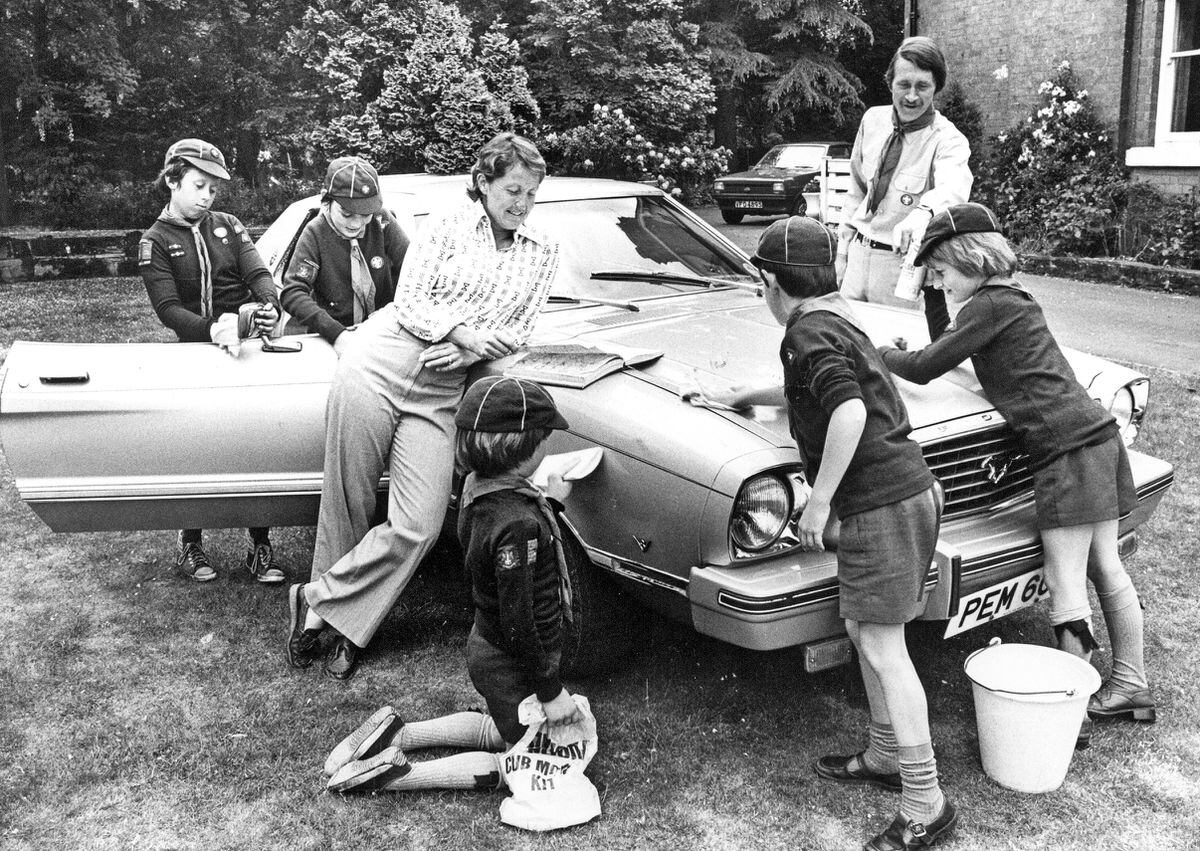 4th Tettenhall Cubs cleaning Rachael's Ford Mustang. She was known for her love of fast cars.