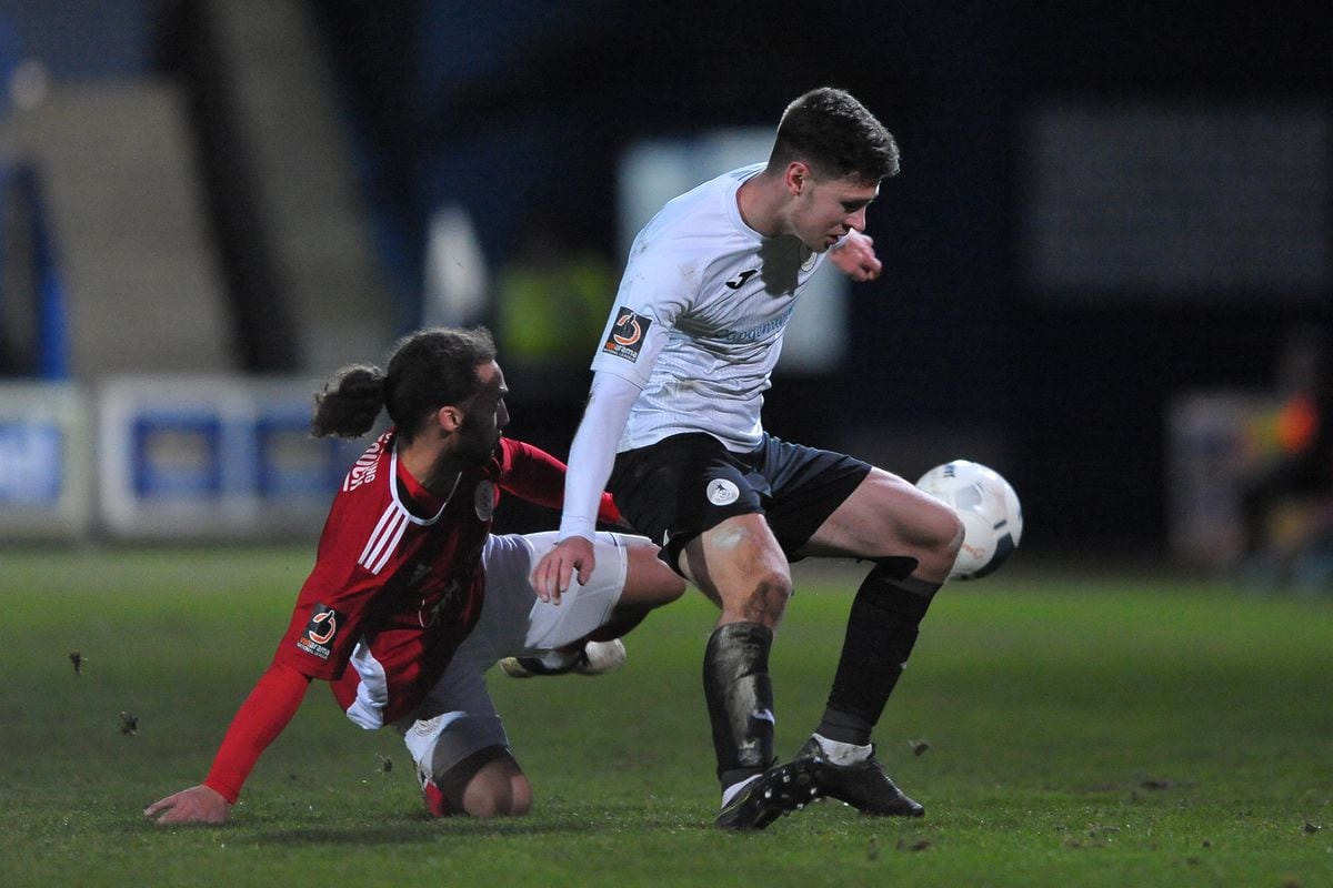 Ryan Barnett of Telford is tackled by Ellis Myles of Brackley (Picture credit: Mike Sheridan/Ultrapress)