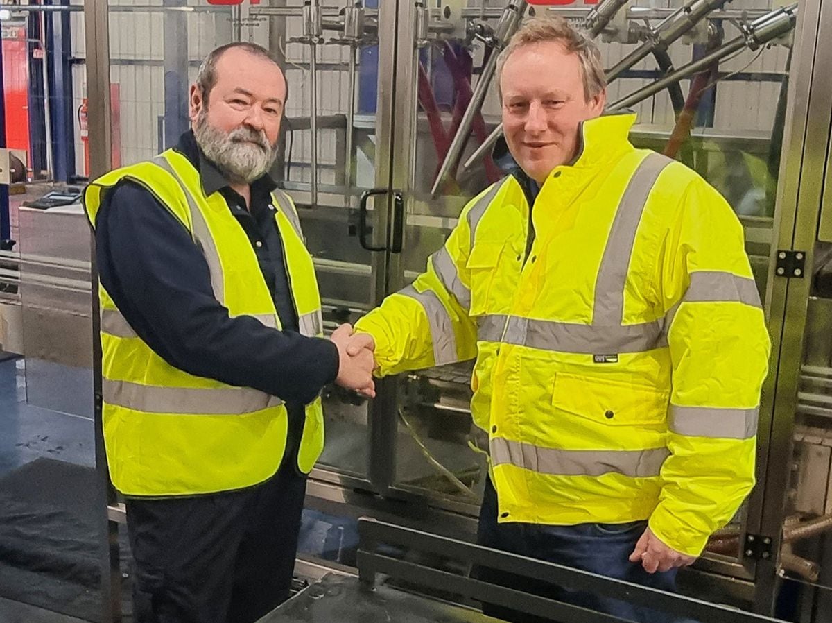 Rob Woodcock (left) with Morris Lubricants’ executive chairman Edward Goddard on his last day in work at Morris Lubricants after near 38 years’ service.