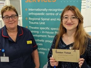 Leah Beech, Student Nurse, receiving her Golden Ticket from Louise Pearson, Assistant Chief Nurse (Corporate) at RJAH.