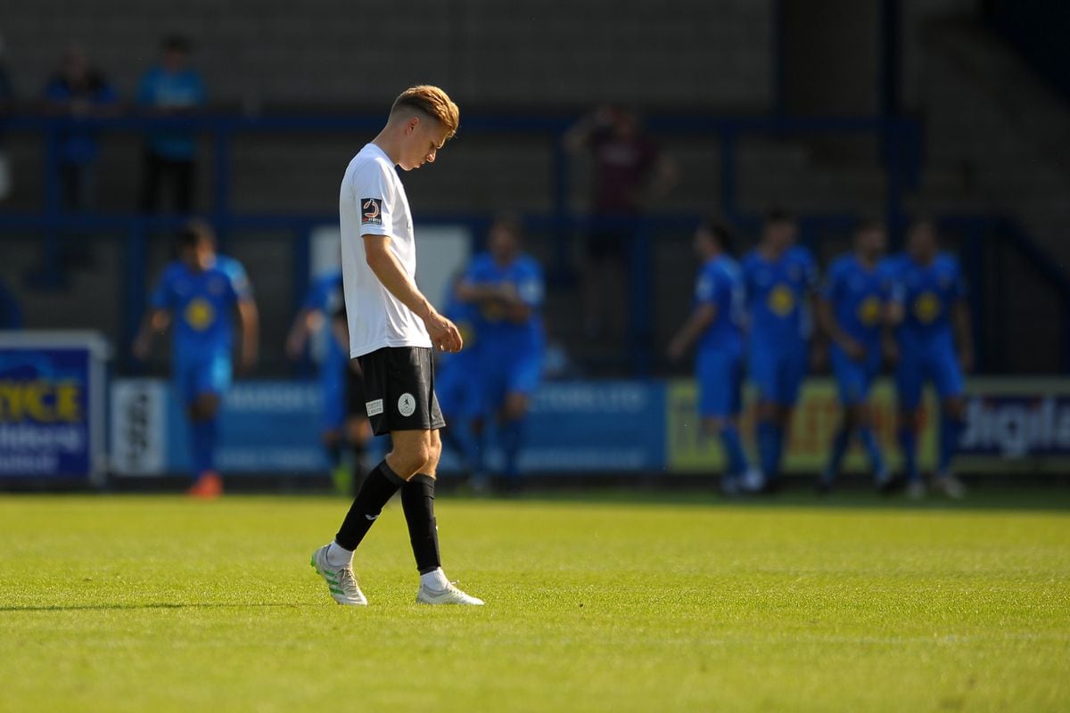 Henry Cowans of Telford reacts after Leamington score