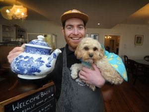 Tea Junction & More owner Jake Holdsworth with Frankie the dog