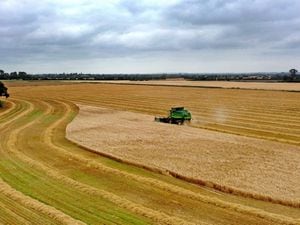 A combine harvester in operation (Gareth Fuller/PA)