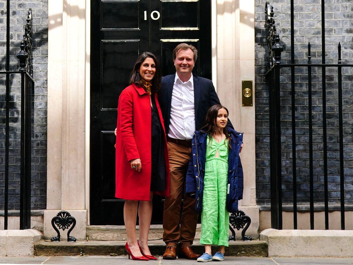 Nazanin Zaghari-Ratcliffe with her husband Richard Ratcliffe and daughter Gabriella in Downing Street, central London
