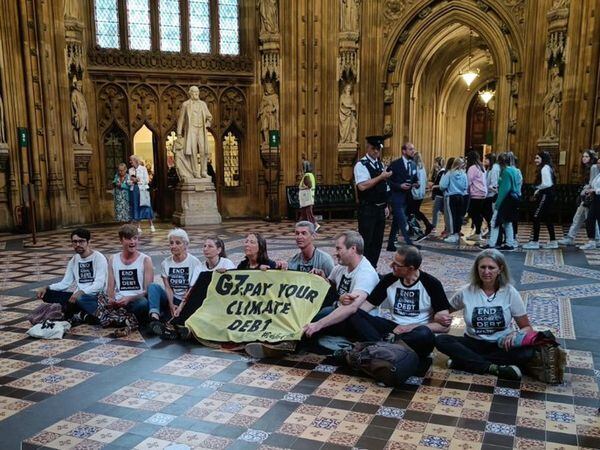 Protestors staged a sit-down protest in Parliament