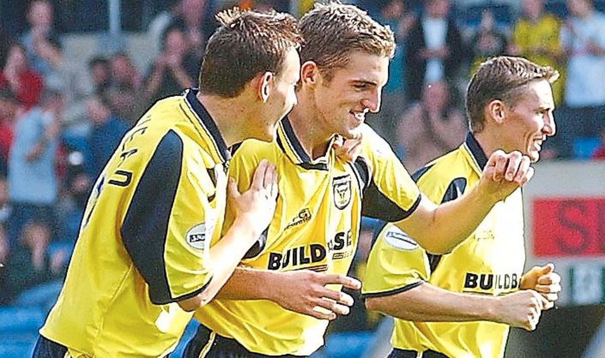 Sam Ricketts, middle, celebrates for Oxford in September 2001 alongside fellow youth team graduate Dean Whitehead, left, who has just joined Town as first team coach Pic: Oxford Mail