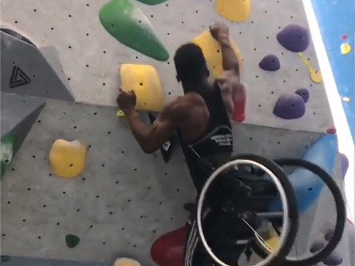 Woody Belfort tackling the climbing wall