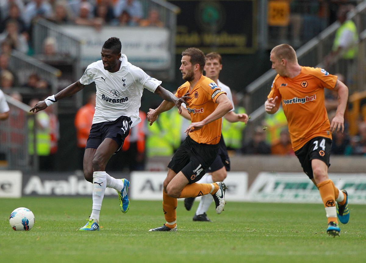 Tottenham Hotspur's Emmanuel Adebayor (left) in action against Wolverhampton Wanderers' Roger Johnson (centre) and Jamie O'Hara (right)