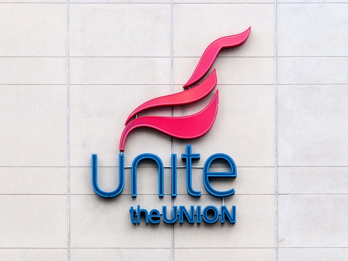 The logo of Unite the Union on a building