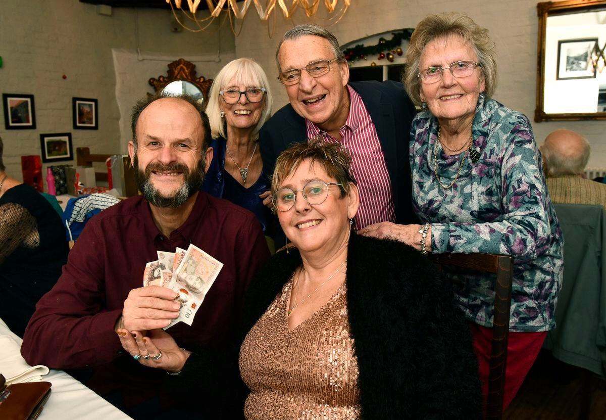 The Ironbridge & Coalbrookdale Civic Society Christmas dinner at the White Hart in Ironbridge.  Secretary Ray Farlow and his wife Sally Ann with Viv and Tony Moore, Margaret Roberts and the £50 anonymous donation. Picture by Dave Bagnall