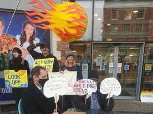 Campaigners held a 'Don't Look Up' protest outside Theatre Severn