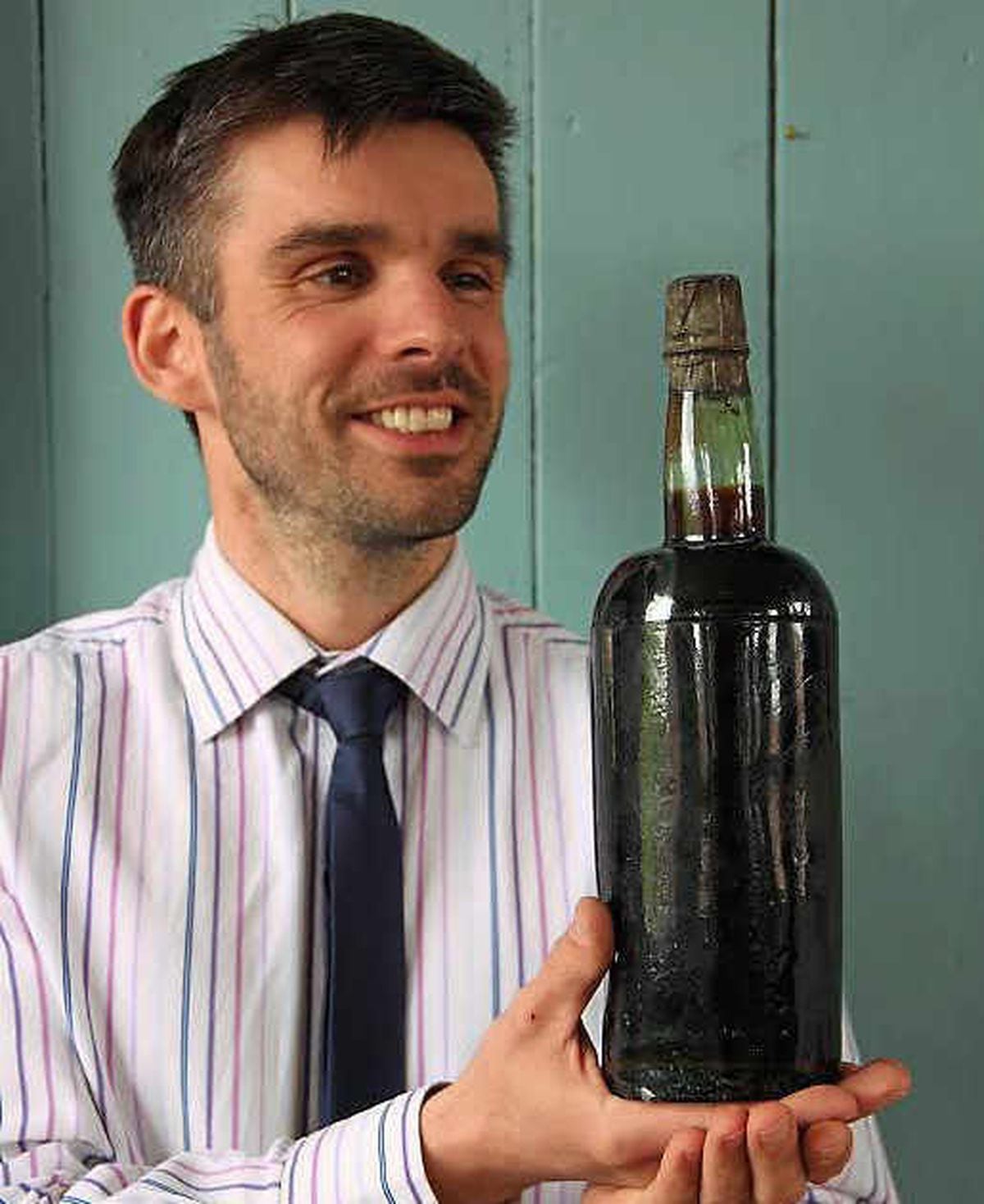 Aaron Dean with the bottle