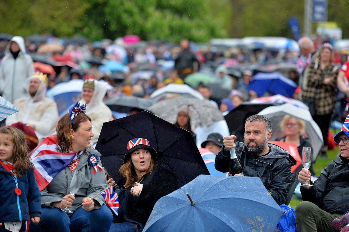 There were thousands of people enjoying the coronation despite poor weather