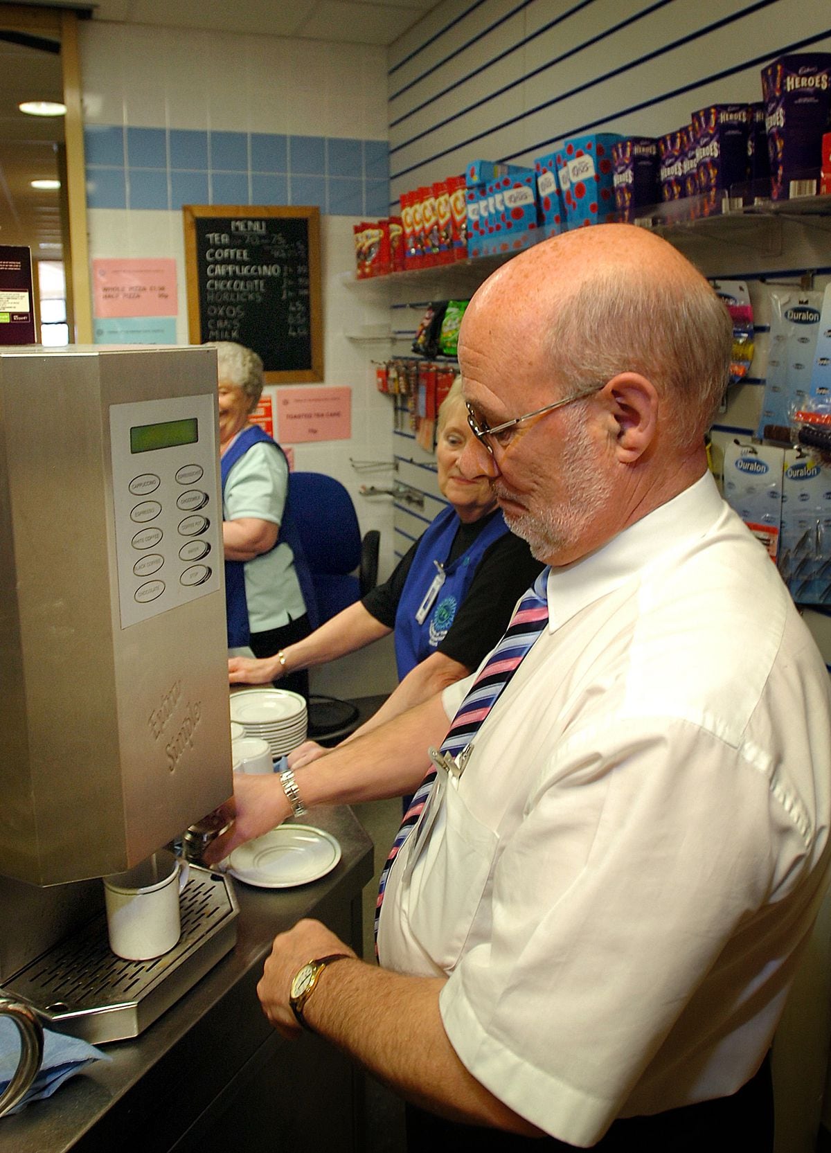 Alan serving coffee at the Princess Royal Hospital in 2010.