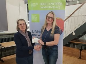 Jane Preston, Telford debt centre manager for Christians Against Poverty, receives a cheque for £1,000 from Jackie Goodman, chairman of Wrekin Landlords Axxociation