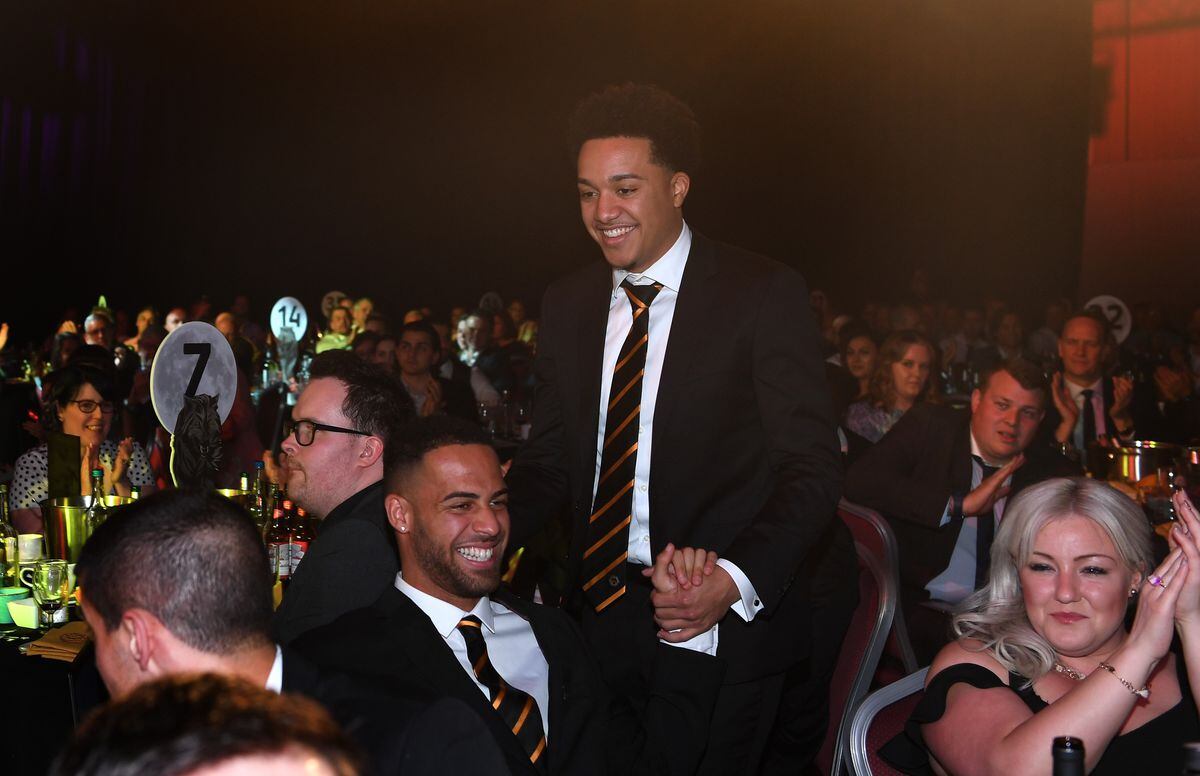 Helder Costa of Wolverhampton Wanderers on his way up to collect an award at the end of season dinner