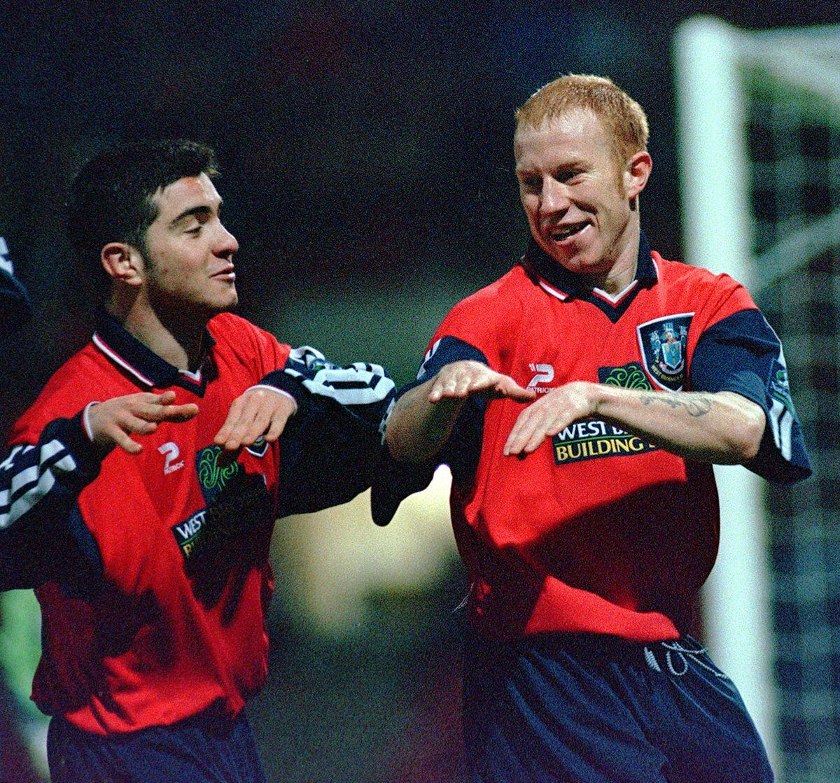Albion's Lee Hughes celebrates his goal with team mate Enzo Maresca during the baggies 3-0 win at the McAlpine stadium.