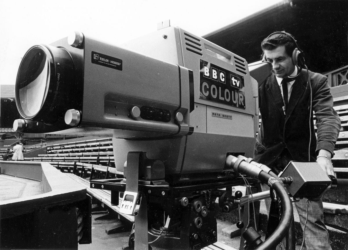 The match was in colour, even if the photograph isn't: a cameraman filming the first colour broadcast at Wimbledon in 1967