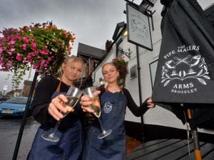 Staff members Liv Duppa and Amy Harper outside The Pipe Makers Arms 