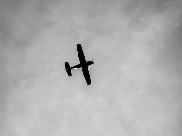 Silhouette of a small aircraft