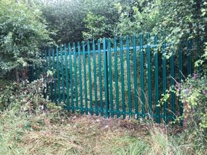 Thew newly erected fence around the former Monsanto site near Ironbridge Gorge