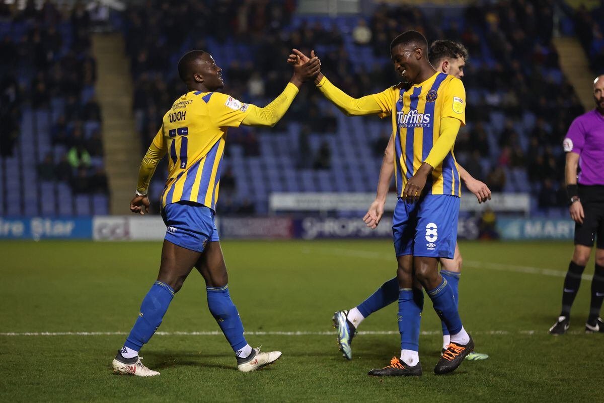 Daniel Udoh of Shrewsbury Town celebrates after scoring a goal to make it 4-0 with Tyrese Fornah (AMA)