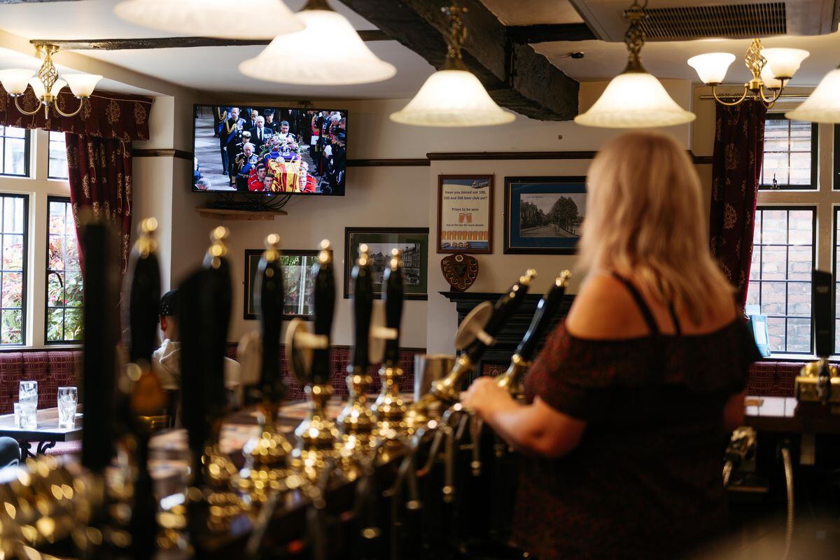 The funeral of Queen Elizabeth II is streamed live at The Royal Oak Pub in Coton Hill, Shrewsbury