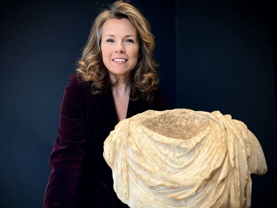 Christina Trevanion with the Roman marble bust which sold for £27,000