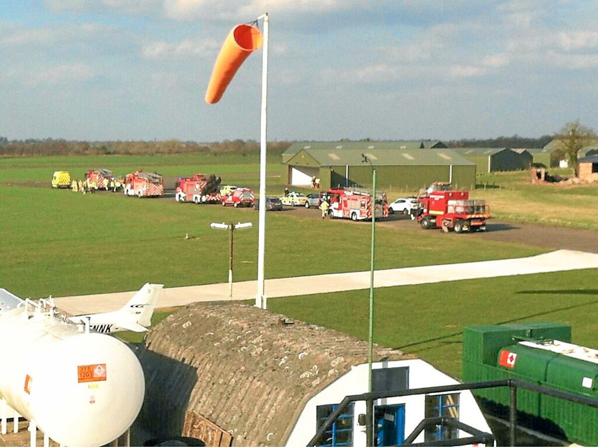 Emergency services at Sleap Airfield for a previous emergency landing