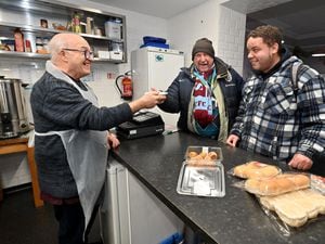 Arthur Shepherd serves up warm soup to Kevin Mitchell and Jonathan Wootton at Strickland House, Wellington
