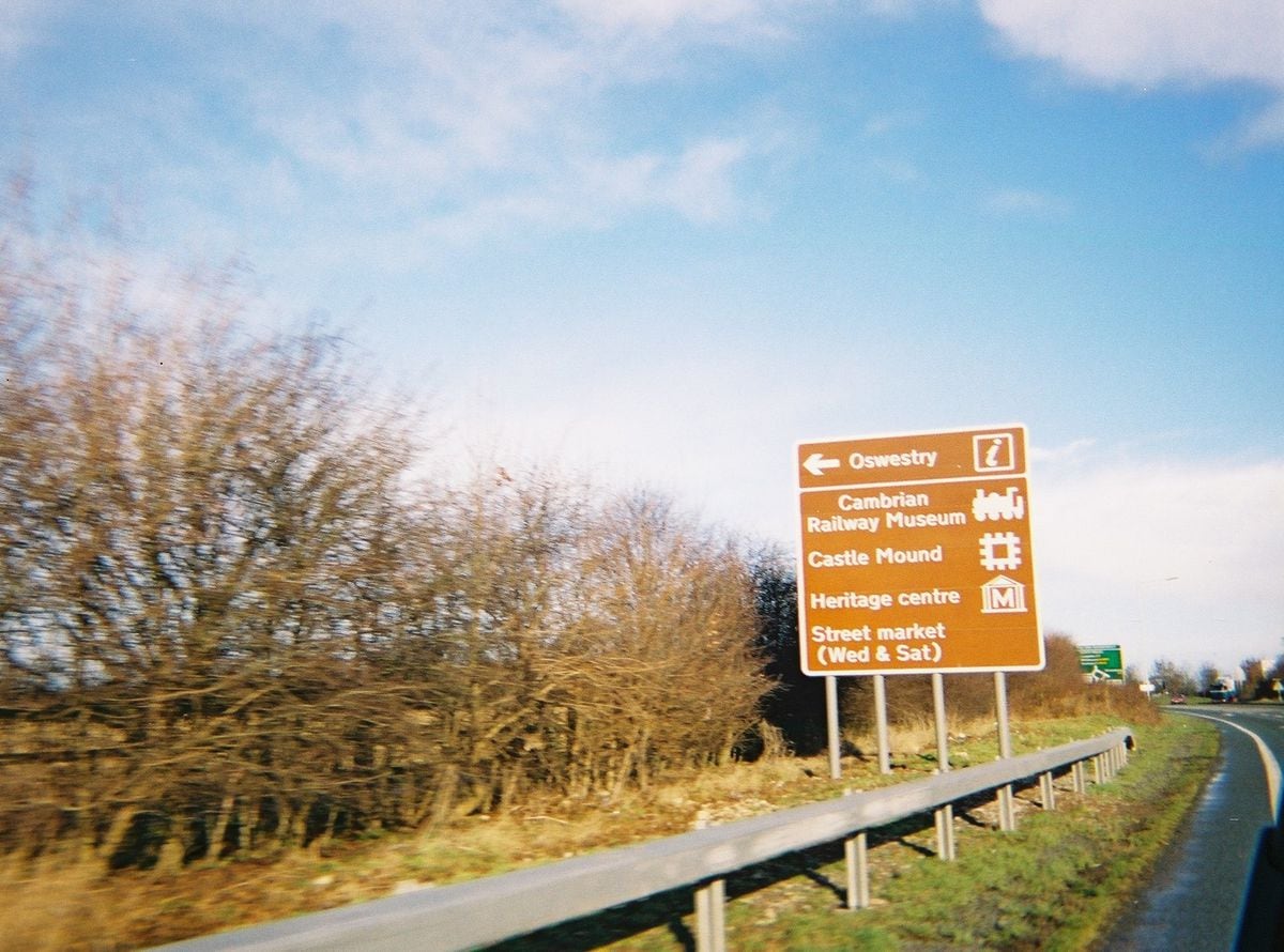 Brown tourism signs on the Oswestry bypass pointing visitors to the town's attractions.1_BROWNS.JPG