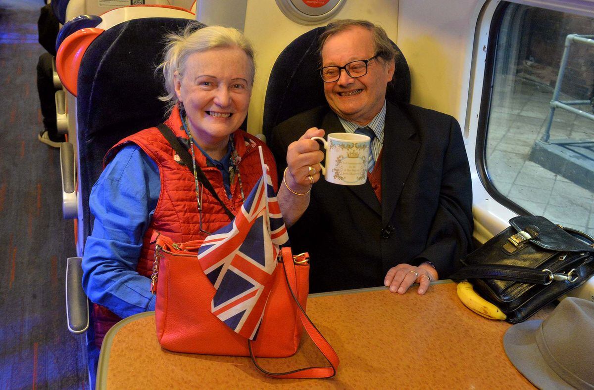 Anita and Imre Tolgyesi Stanley enjoy a cuppa on the train journey