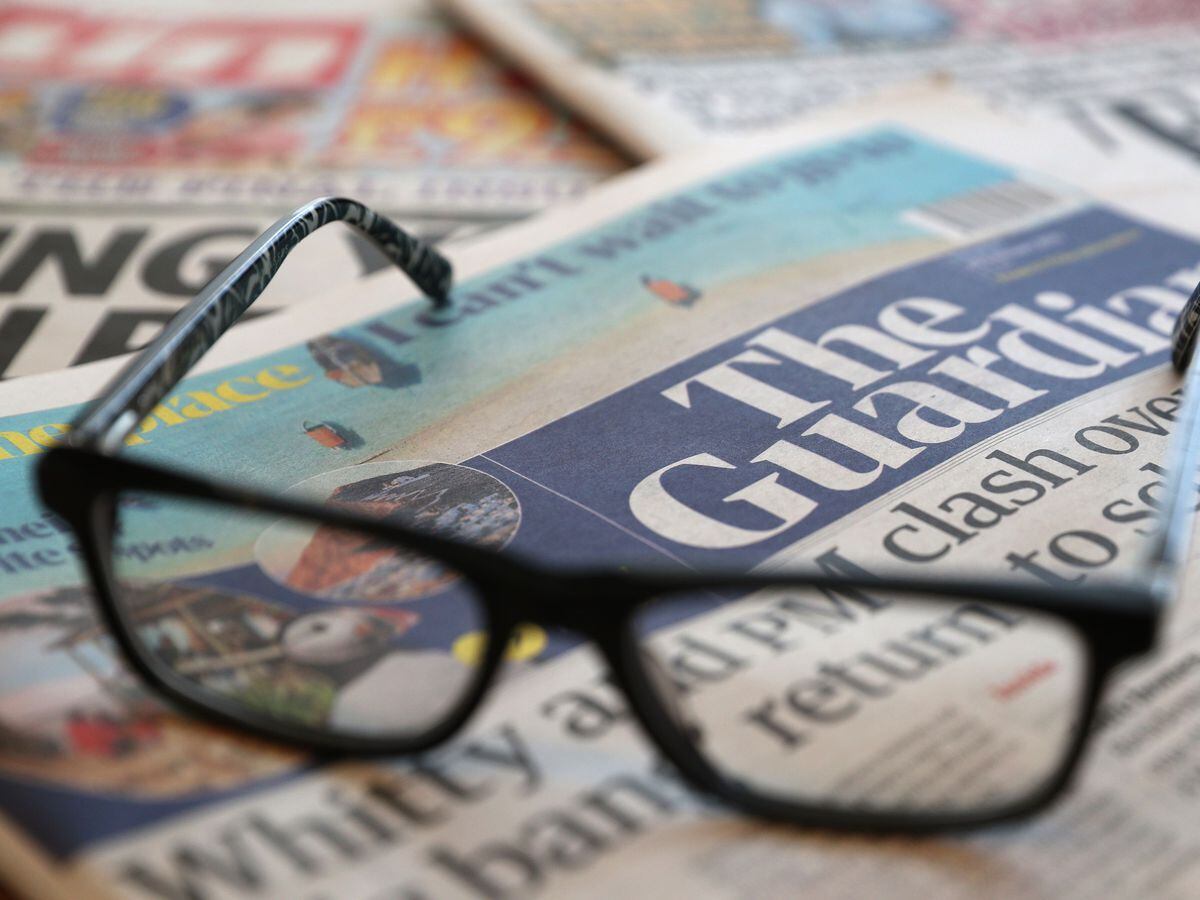 A stock image of a pile of newspapers including The Daily Telegraph, The Guardian, Daily Mirror, Daily Mail, Daily Express and The Sun