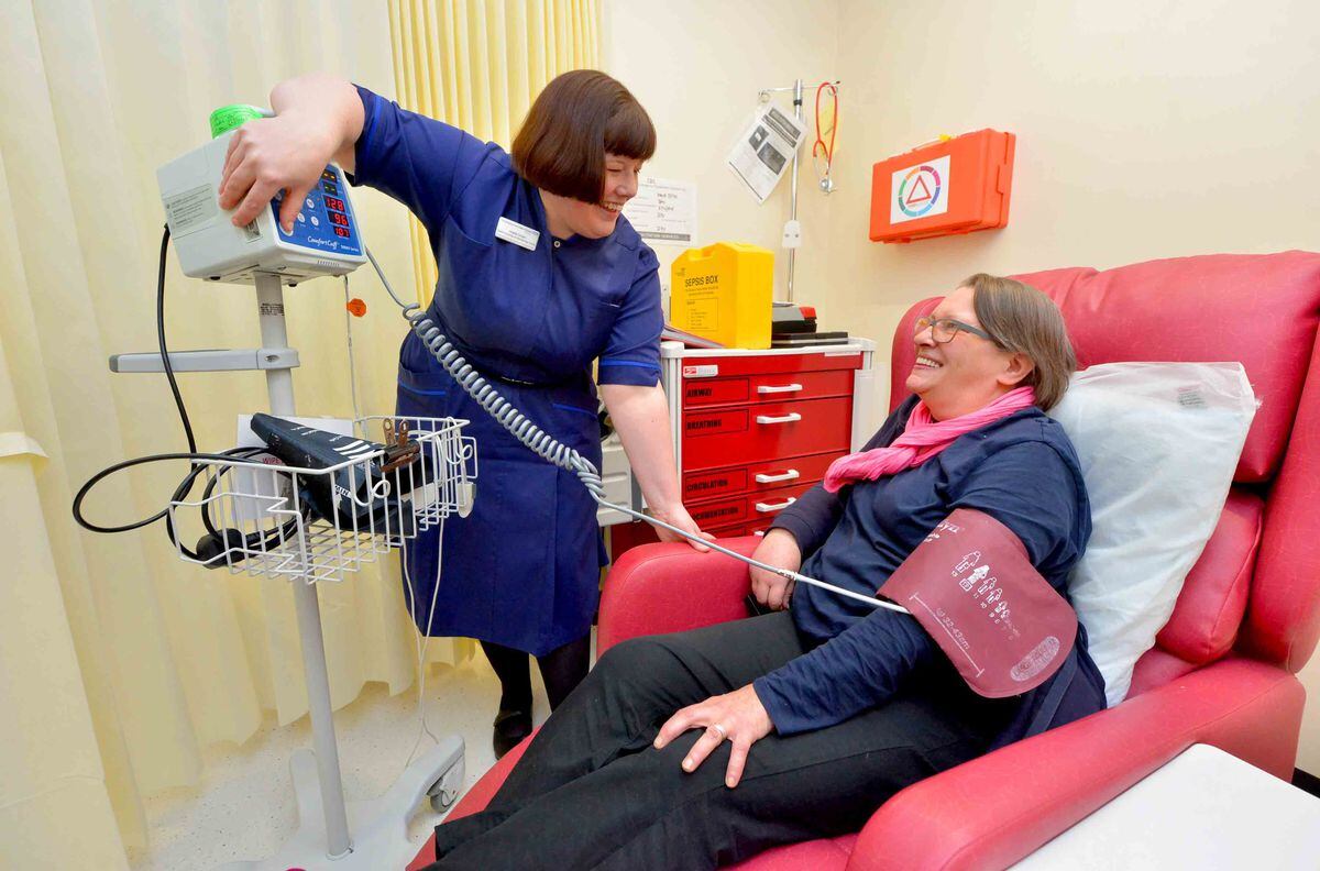 Matron Angie Cooper checks Clare Wheatley's blood pressure