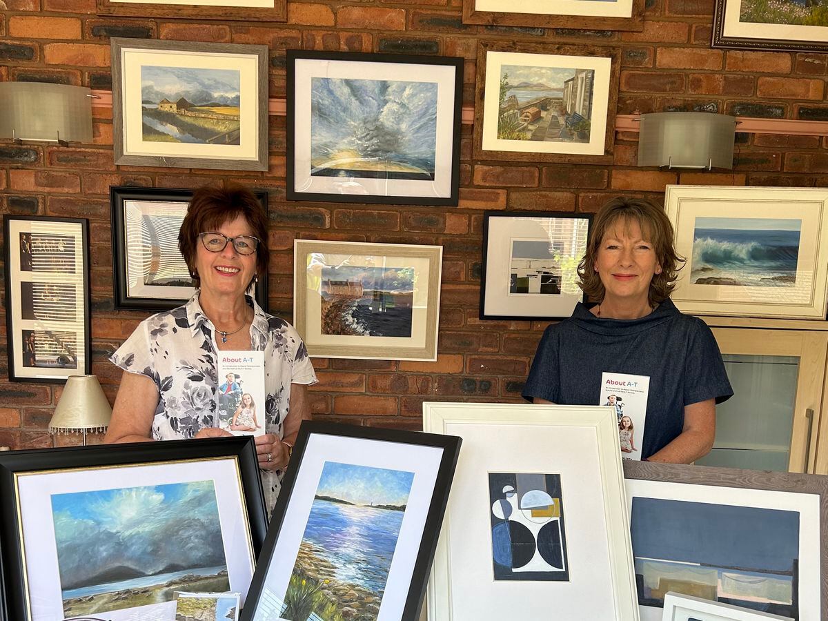 Beverley Wightman and Annette Hughes with their art work