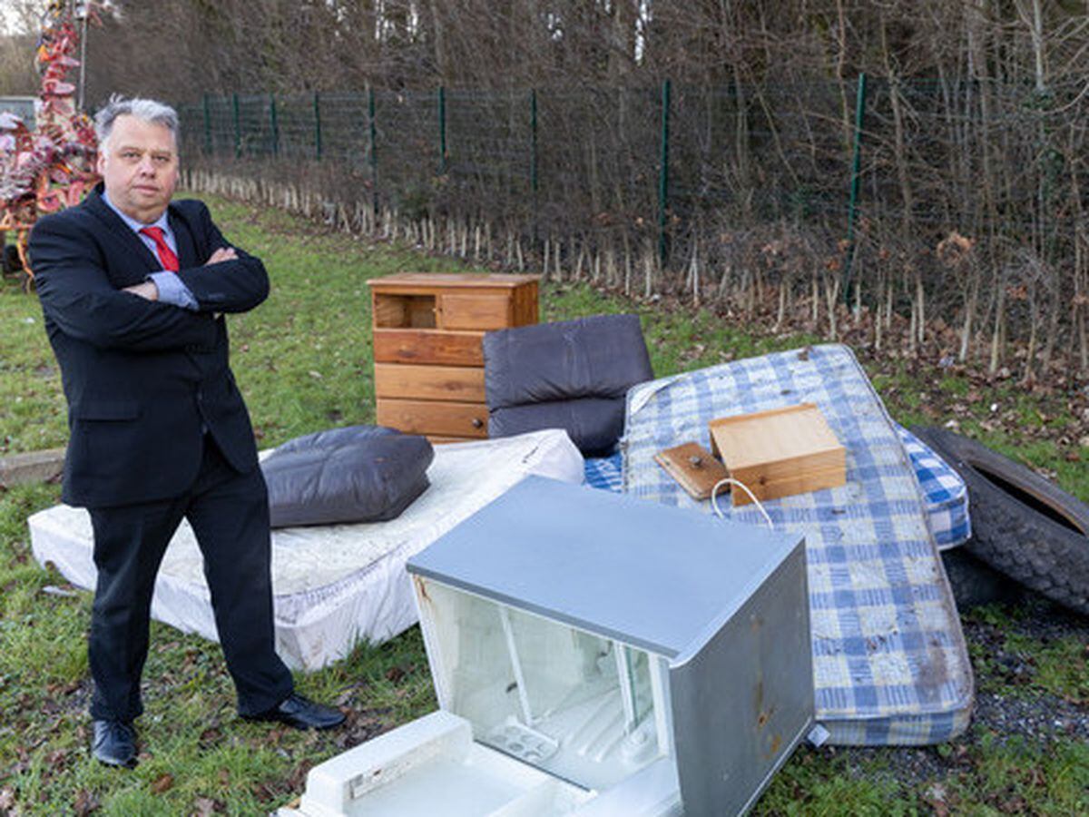 Councillor Richard Overton with examples of items which are often illegally fly-tipped 