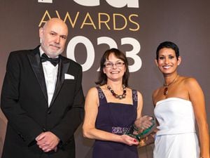Trudy Davies is pictured with John Howard, circulation director of Reach who sponsored the category, and Naga Munchetty, who hosted the ceremony. Photo: Ray Schram.