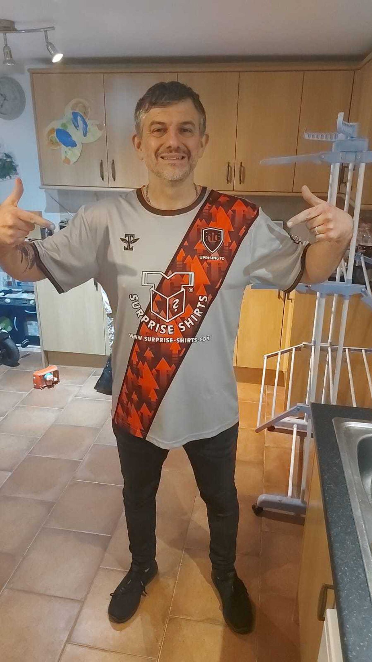 Gareth Thomas showing off a sylish Uprising FC shirt