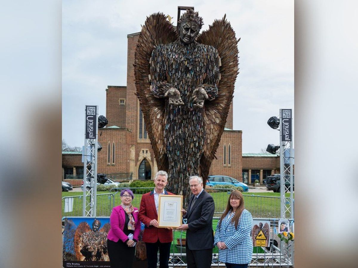 Pictured with the Knife Angel are the Dean of Guildford The Very Reverend Dianna Gwilliams, Clive Knowles, the Duke of Gloucester and Julie Liddicot